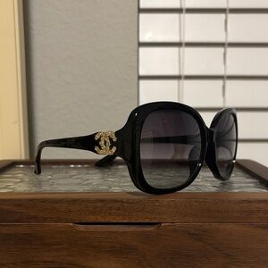 CHANEL Black Sunglasses with Gold Logo